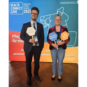 Ursula Gilles von gigabit.consulting und Dr. Maximilian Rückert, Bayerisches Staatsministerium für Gesundheit und Pflege